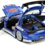 ماشین فلزی مزدا 1993 مدل RX-7 و فیگور فلزی Chun-Li با مقیاس 1:24, تنوع: 253255062-ChunLi, image 8