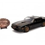 ماشین فلزی پونتیاک مدل 1977 Firebird به همراه نشان فلزی Smokey and the Bandit با مقیاس 1:24, image 9