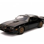 ماشین فلزی پونتیاک مدل 1977 Firebird به همراه نشان فلزی Smokey and the Bandit با مقیاس 1:24, image 6